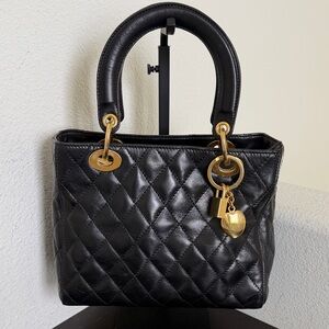 VINTAGE Russell & Bromley Black Leather Quilted Satchel with Gold Hardware.